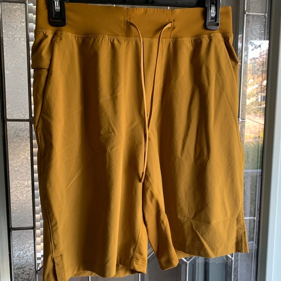 29. Men’s Size Small LULULEMON Golden Yellow Shorts - Picture 1 of 5